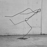 Iron rod sculpture Flight by Gergana Toleva depicting the moment of paragliding takeoff